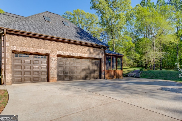 476 Walnut Rd, Hoschton, GA 30548 - view of property exterior featuring a shingled roof, concrete driveway, brick siding, and a garage