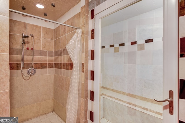 476 Walnut Rd, Hoschton, GA 30548 - bathroom featuring tiled shower and recessed lighting