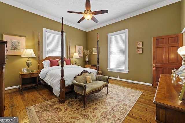 bedroom with ceiling fan, baseboards, crown molding, and wood finished floors