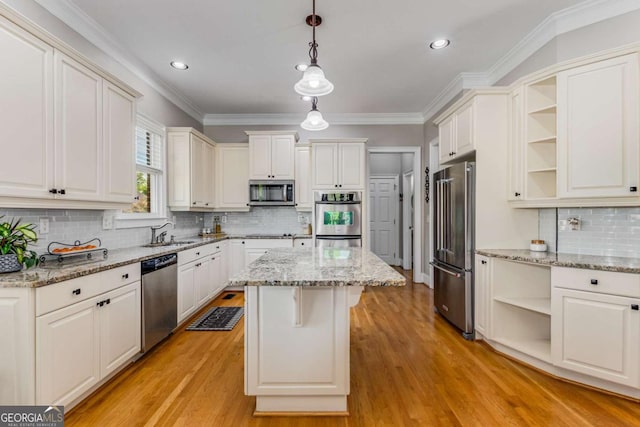 895 Ovalene Ln SW, Marietta, GA 30064 - kitchen with open shelves, stainless steel appliances, a kitchen island, decorative backsplash, and decorative light fixtures