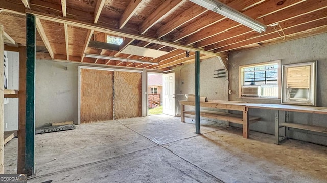miscellaneous room with a workshop area