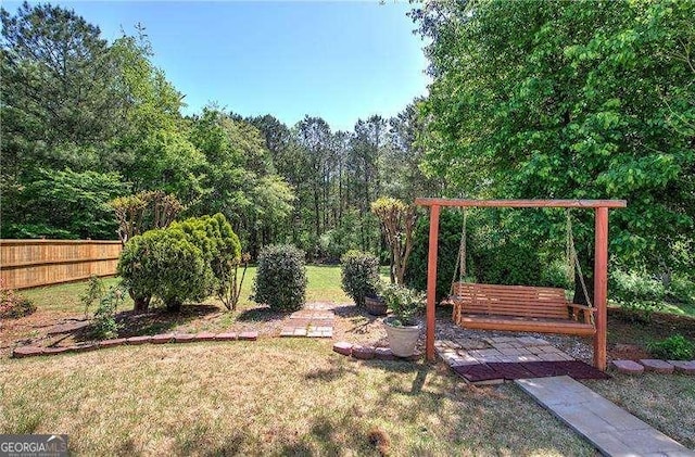 view of yard featuring fence