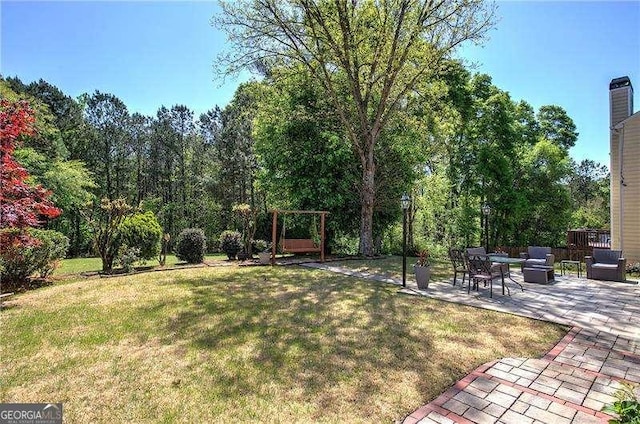 view of yard with a patio area