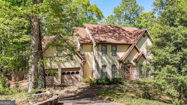 3200 Country Club Ct NW, Kennesaw, GA 30144 - view of front of home with roof with shingles, driveway, and stucco siding