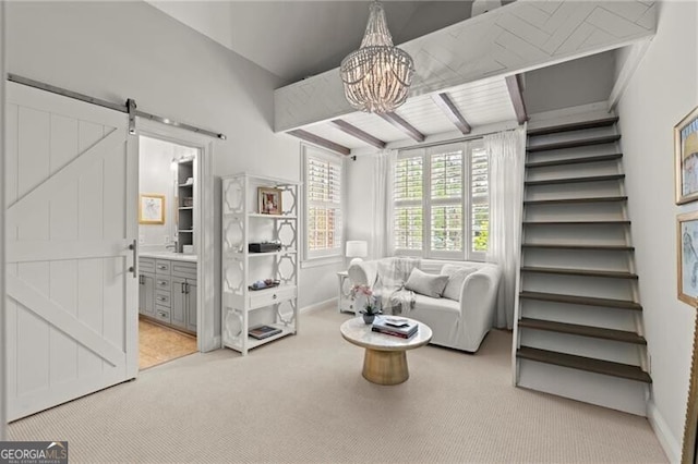 3749 Watkins Pl NE, Brookhaven, GA 30319 - living room featuring light carpet, a barn door, a chandelier, baseboards, and beamed ceiling