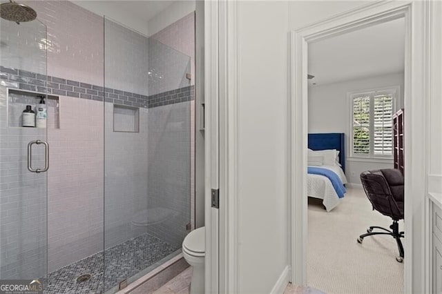 3749 Watkins Pl NE, Brookhaven, GA 30319 - bathroom featuring a shower stall, ensuite bathroom, baseboards, and toilet