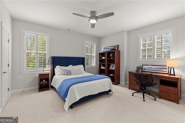 3749 Watkins Pl NE, Brookhaven, GA 30319 - bedroom with carpet flooring, baseboards, ceiling fan, and an office area