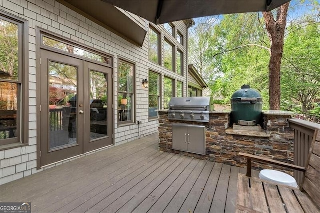 3749 Watkins Pl NE, Brookhaven, GA 30319 - wooden terrace with french doors