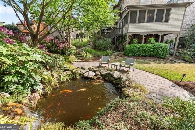3749 Watkins Pl NE, Brookhaven, GA 30319 - view of yard featuring stairway and a patio