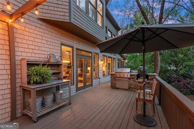 3749 Watkins Pl NE, Brookhaven, GA 30319 - deck at dusk featuring french doors and a grill