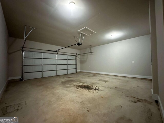 349 Park Blvd W, Athens, GA 30606 - garage featuring a garage door opener and baseboards
