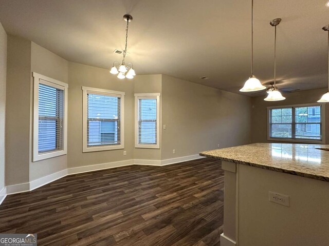 349 Park Blvd W, Athens, GA 30606 - kitchen with a chandelier, dark wood-style floors, baseboards, and open floor plan