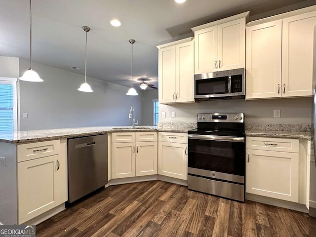 349 Park Blvd W, Athens, GA 30606 - kitchen featuring stainless steel appliances, a sink, a peninsula, dark wood-style flooring, and recessed lighting