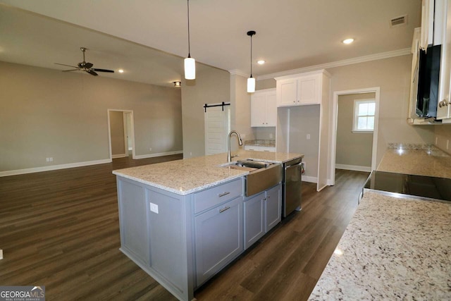 kitchen featuring white cabinetry, a ceiling fan, visible vents, dishwasher, and a sink