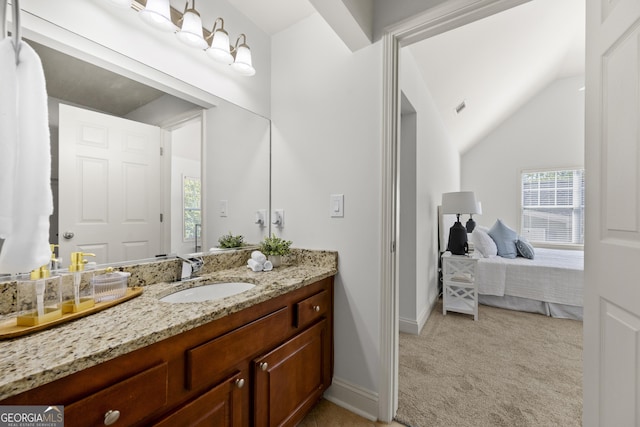 503 Madison Ct Unit 503, Smyrna, GA 30080 - bathroom featuring visible vents, baseboards, ensuite bath, vanity, and lofted ceiling