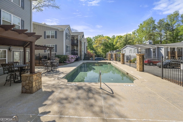 503 Madison Ct Unit 503, Smyrna, GA 30080 - view of swimming pool featuring a pergola, fence, a patio, a fenced in pool, and a residential view