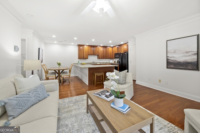 503 Madison Ct Unit 503, Smyrna, GA 30080 - living room featuring crown molding, baseboards, recessed lighting, and dark wood-style floors