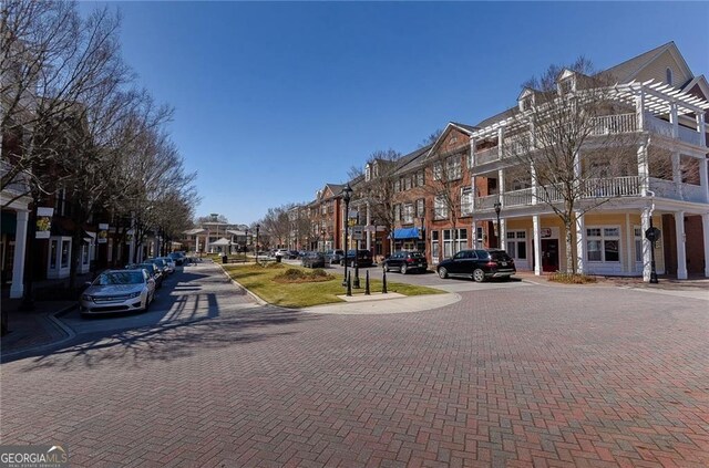 503 Madison Ct Unit 503, Smyrna, GA 30080 - view of road featuring curbs, a residential view, and sidewalks