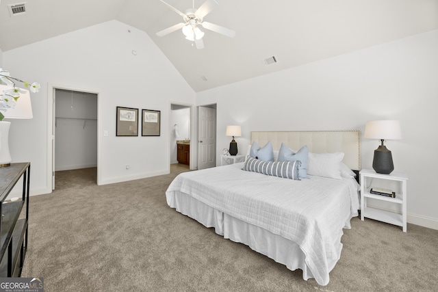 503 Madison Ct Unit 503, Smyrna, GA 30080 - bedroom featuring visible vents, a spacious closet, high vaulted ceiling, and carpet flooring