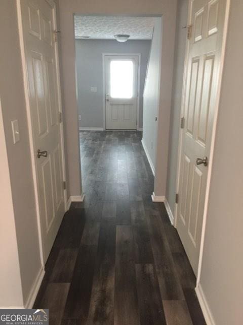 4413 Pinscher St, Union City, GA 30291 - corridor featuring baseboards and dark wood-style floors