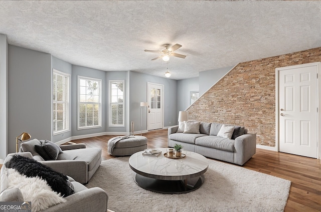 4413 Pinscher St, Union City, GA 30291 - living area with baseboards, ceiling fan, and wood finished floors