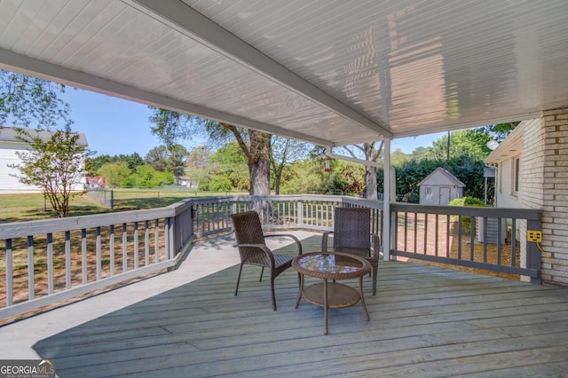 deck with an outdoor structure and a storage unit