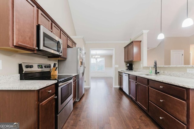 204 Arapahoe Ct, Villa Rica, GA 30180 - kitchen with dark wood finished floors, a sink, pendant lighting, a peninsula, and appliances with stainless steel finishes
