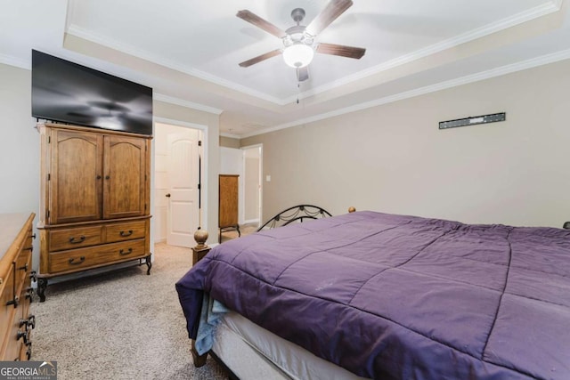 204 Arapahoe Ct, Villa Rica, GA 30180 - bedroom with a ceiling fan, light carpet, ornamental molding, and a tray ceiling