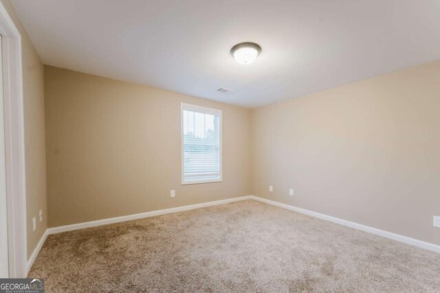 204 Arapahoe Ct, Villa Rica, GA 30180 - carpeted empty room featuring visible vents and baseboards