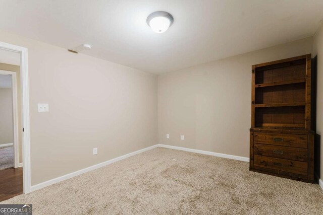 204 Arapahoe Ct, Villa Rica, GA 30180 - carpeted empty room featuring baseboards