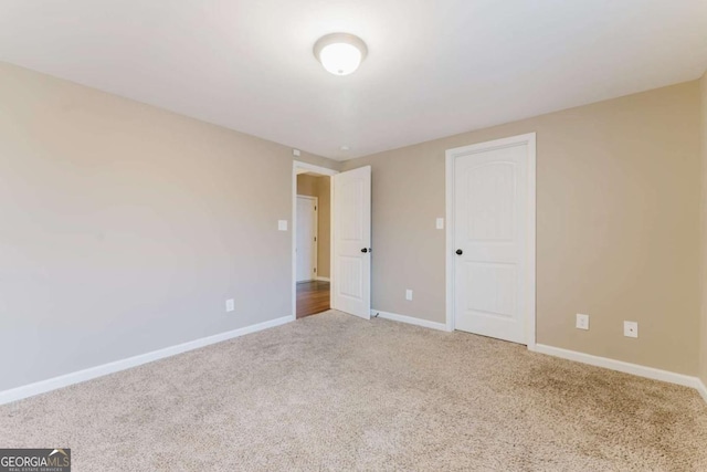 204 Arapahoe Ct, Villa Rica, GA 30180 - empty room featuring baseboards and carpet