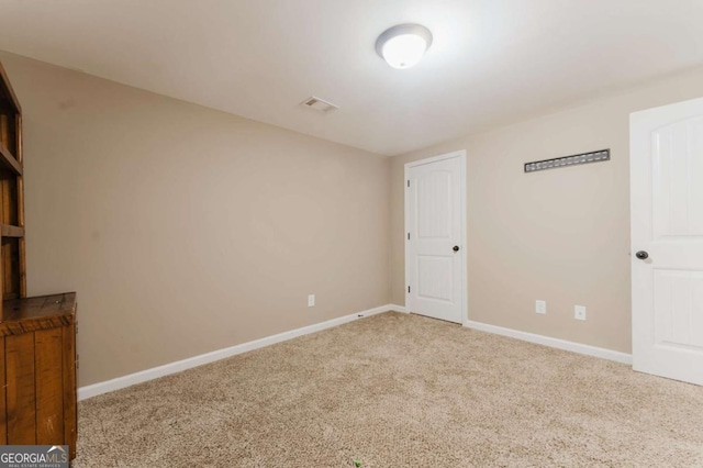 204 Arapahoe Ct, Villa Rica, GA 30180 - spare room featuring baseboards, carpet flooring, and visible vents