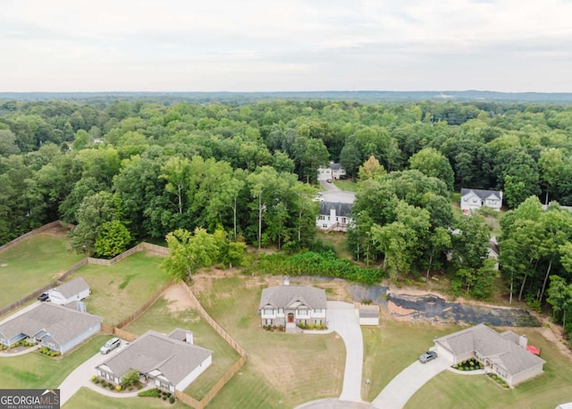 204 Arapahoe Ct, Villa Rica, GA 30180 - bird's eye view with a wooded view