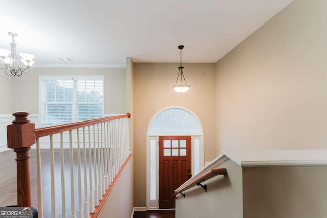 204 Arapahoe Ct, Villa Rica, GA 30180 - foyer entrance featuring ornamental molding and a chandelier