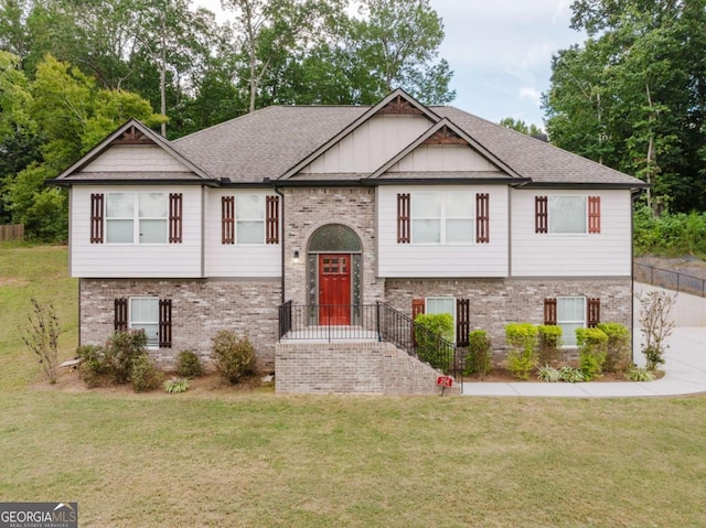 204 Arapahoe Ct, Villa Rica, GA 30180 - raised ranch with a shingled roof, a front lawn, and brick siding