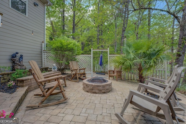 2 Blue Heron Dr, Monticello, GA 31064 - view of patio featuring an outdoor fire pit