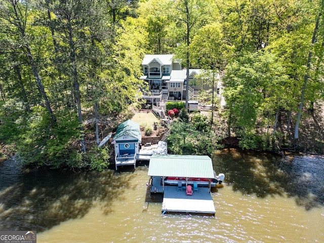 2 Blue Heron Dr, Monticello, GA 31064 - view of dock with a water view, stairs, and a forest view