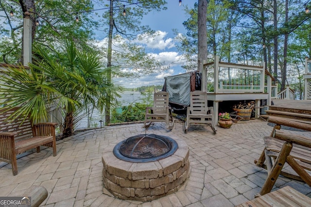 2 Blue Heron Dr, Monticello, GA 31064 - view of patio / terrace featuring an outdoor fire pit and a wooden deck
