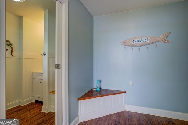 2 Blue Heron Dr, Monticello, GA 31064 - corridor featuring wood finished floors and wainscoting