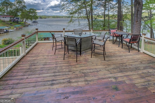 2 Blue Heron Dr, Monticello, GA 31064 - deck with outdoor dining area and a water view