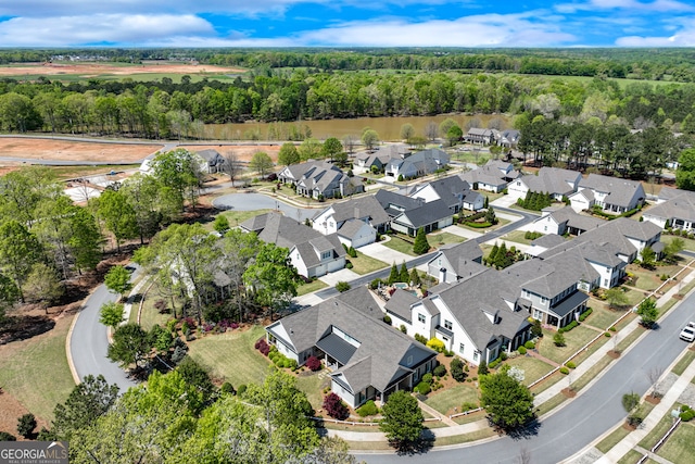 2616 Bent Pine Dr, Statham, GA 30666 - aerial view of property and surrounding area with a heavily wooded area and nearby suburban area