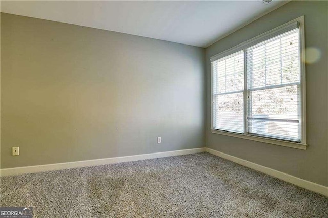 974 Regal Hills Ln, Mableton, GA 30126 - empty room with baseboards and carpet flooring