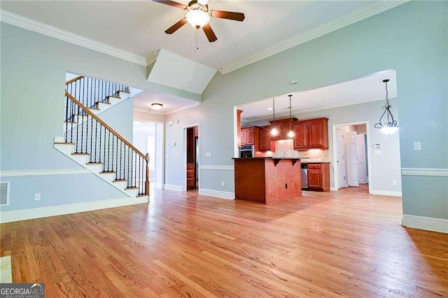 974 Regal Hills Ln, Mableton, GA 30126 - unfurnished living room featuring light wood finished floors, ceiling fan, ornamental molding, and stairs