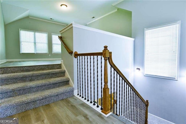 974 Regal Hills Ln, Mableton, GA 30126 - stairway featuring wood finished floors, baseboards, ornamental molding, and lofted ceiling