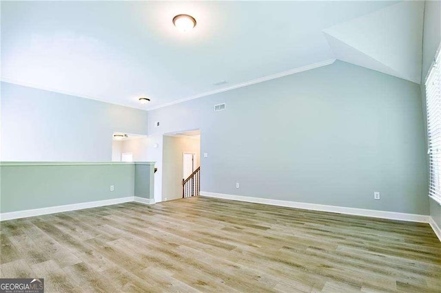 974 Regal Hills Ln, Mableton, GA 30126 - interior space with visible vents, baseboards, vaulted ceiling, and wood finished floors