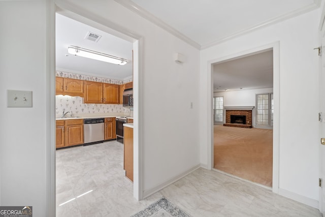 hall with marble finish floor, visible vents, crown molding, and baseboards