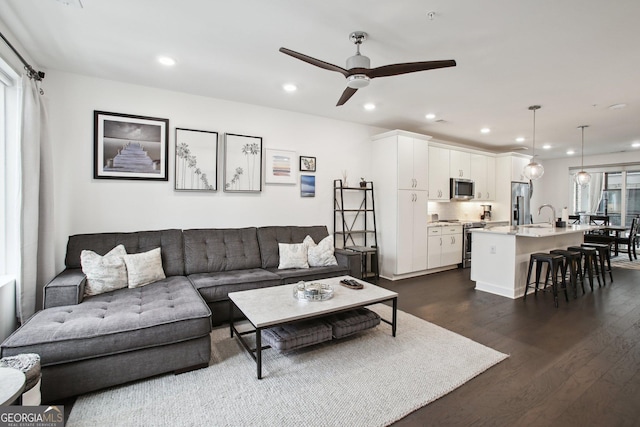 1050 Stacks Ave SE Unit 1507, Atlanta, GA 30315 - living room featuring dark wood-style floors, a ceiling fan, and recessed lighting