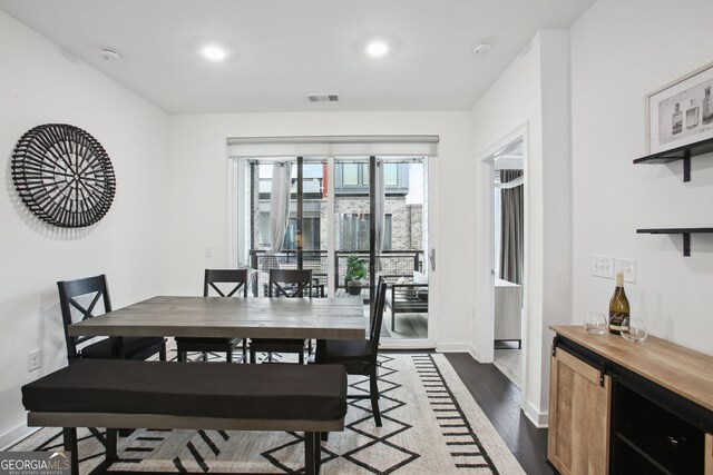 1050 Stacks Ave SE Unit 1507, Atlanta, GA 30315 - dining space featuring dark wood-style flooring, baseboards, and recessed lighting