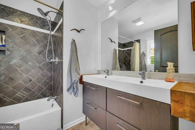 full bathroom with a sink, double vanity, and shower / bath combo