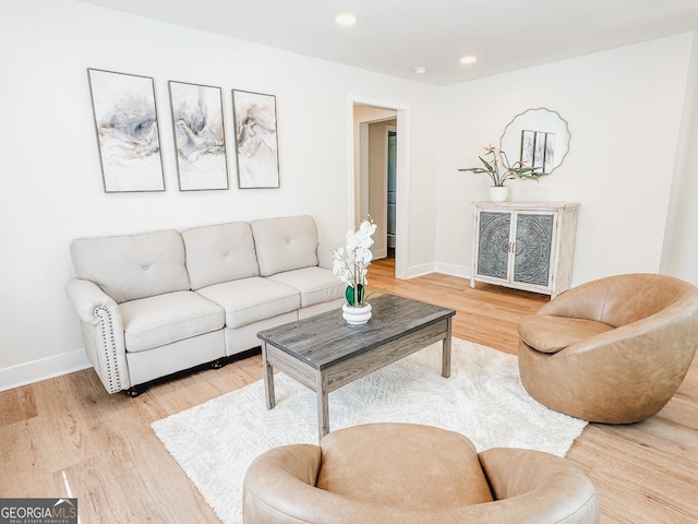947 Reed Ave, East Point, GA 30344 - living room with baseboards, light wood-type flooring, and recessed lighting